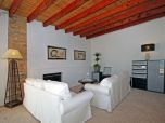 Finca Kamin im Wohnzimmer Mallorca Finca mit Pool  Mallorca romantische Finca Luxus pur Finca Wohnzimmer mit großen Panoramafenster Luxusfinca mieten mit Pool , Luxus-Finca mit Pool und toller Aussicht Mallorca